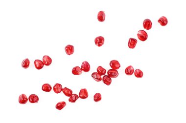 Beyaz arkaplanda nar tohumları