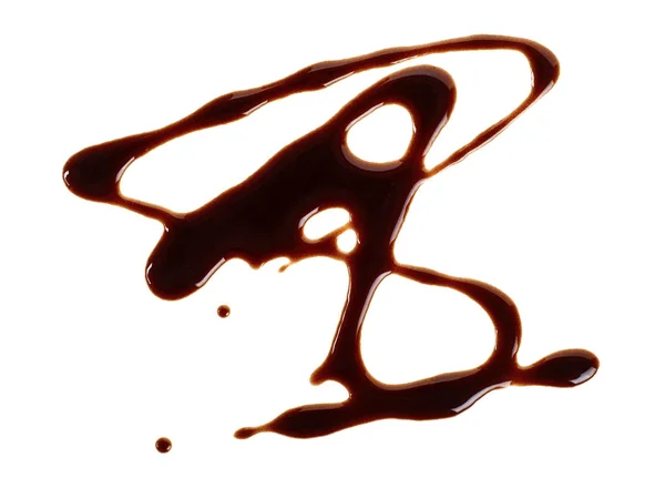 液体巧克力查出在白色背景 由巧克力制成的抽象图案 — 图库照片