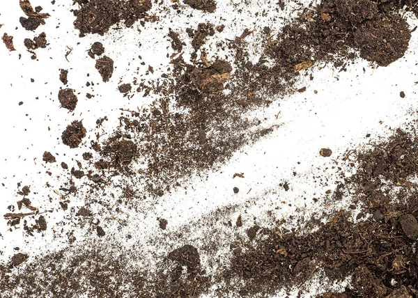 Toprak, beyaz arka plan üzerinde üstten görünüm izole kir yığını.