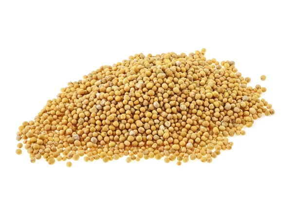 Heap de sementes de mostarda isoladas sobre fundo branco — Fotografia de Stock