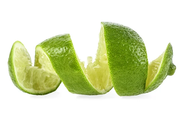 Cut lime in shape of a spiral on white background — Stock Photo, Image