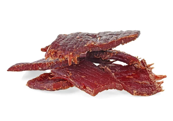 Portion of beef jerky on a white white background. Full depth of — Stock Photo, Image
