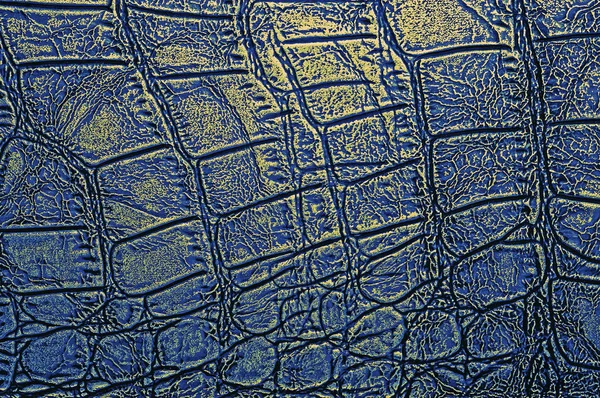 Abstract crocodile leather texture background, closeup. Blue and
