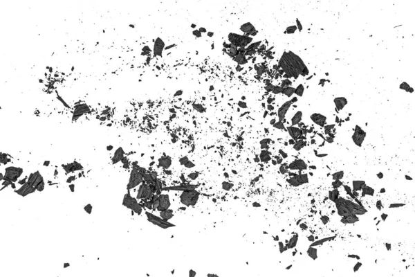 Small pieces of charcoal dust on white background, top view. — Stock Photo, Image