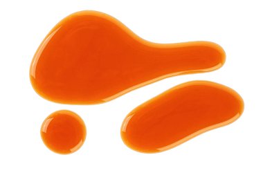 Beyaz arka plan üzerinde izole tatlı Karamel Sos lekeleri