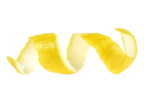 Citronskal eller citron twist på vit bakgrund, närbild. — Stockfoto