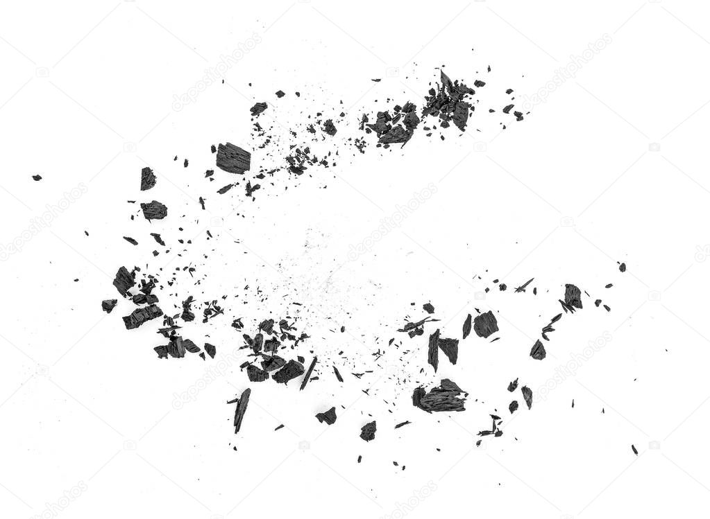 Black coal dust with fragments isolated on white background, top