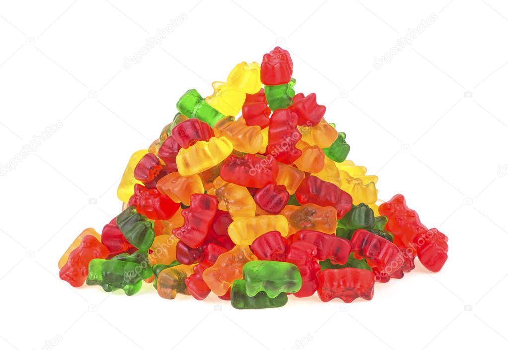 Pile of colorful gummy bears on a white background