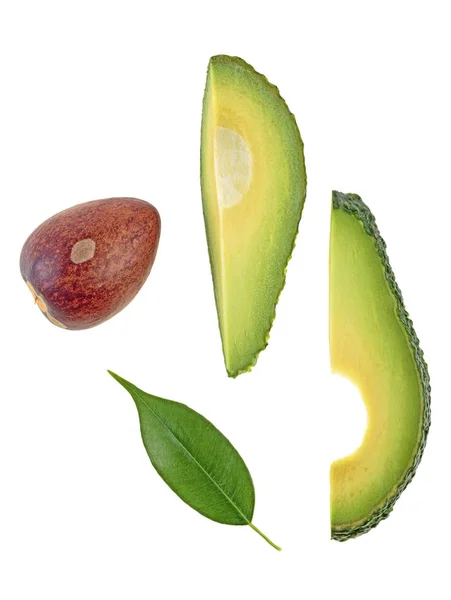 Concetto di cibo sano - fette di avocado con foglia verde e osso o — Foto Stock