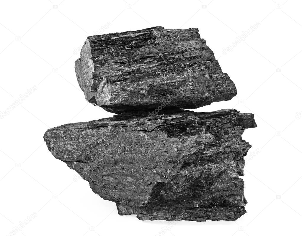 Two pieces of black coal isolated on a white background