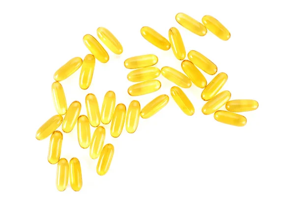 Fish oil capsules isolated on a white background, top view. Royalty Free Stock Photos