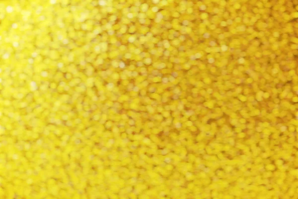 Guld textur bakgrund. Abstrakt bakgrund med bokeh defocuse — Stockfoto