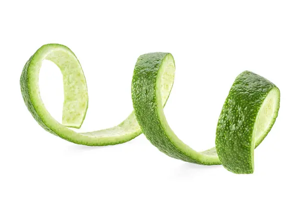 Peel of lime isolated on a white background. Lime peel in spiral — Stock Photo, Image
