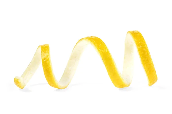 Lemon twist na bílém pozadí. Citrónová kůra. — Stock fotografie