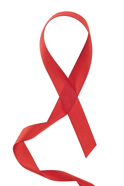 Red support ribbon on a white background. World AIDS Day concept — Stock Photo, Image
