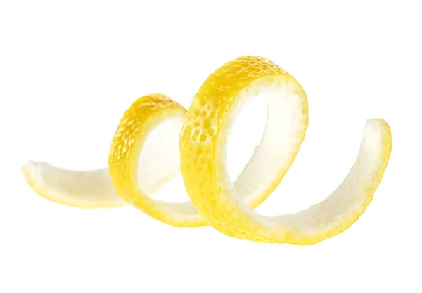 Lemon peel - twist of citrus peel on a white background. — Stock Photo, Image