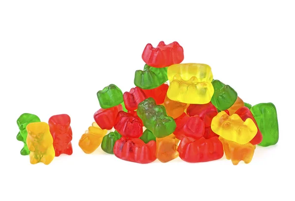 Montón de gelatina osos caramelos aislados sobre fondo blanco, gomoso — Foto de Stock