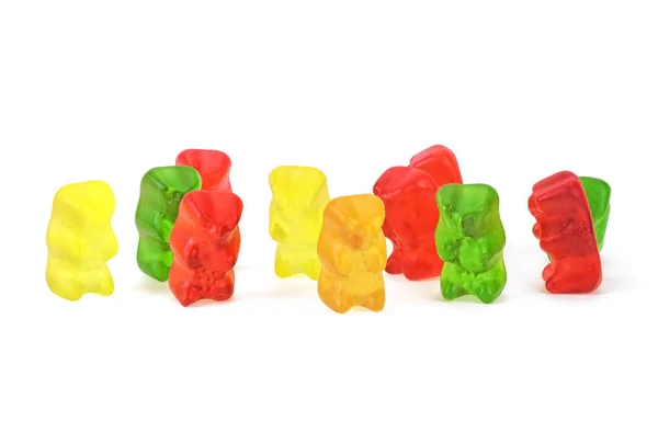 Kleurrijke gummiberen of gelei beren, witte achtergrond. — Stockfoto