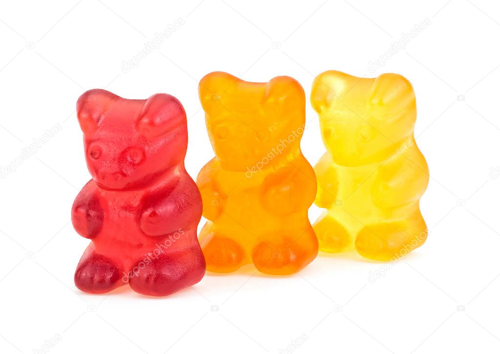 Three colorful gummy bears isolated on a white background. Colorful jelly gummy bears. Chewing jelly candies. Fruity candies.