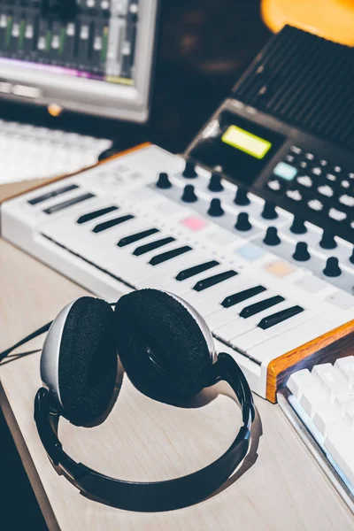 headphone, music keyboard and studio equipment