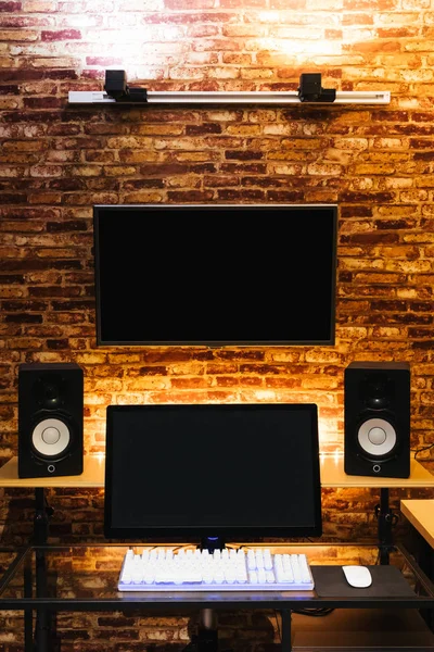 Modern Workspace Dual Computer Monitor Display Professional Loudspeakers Loft Style — Stock Photo, Image