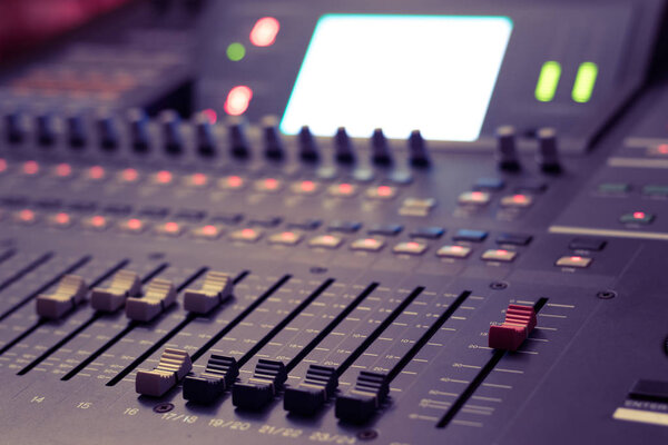 audio mixing console fader. recording, broadcasting, editing, post production concept