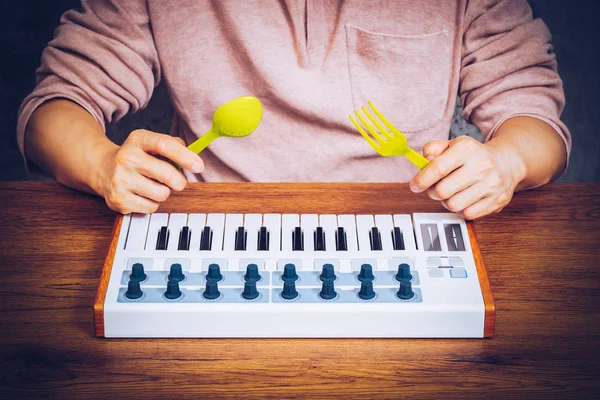 man eating music for food. music lover concept