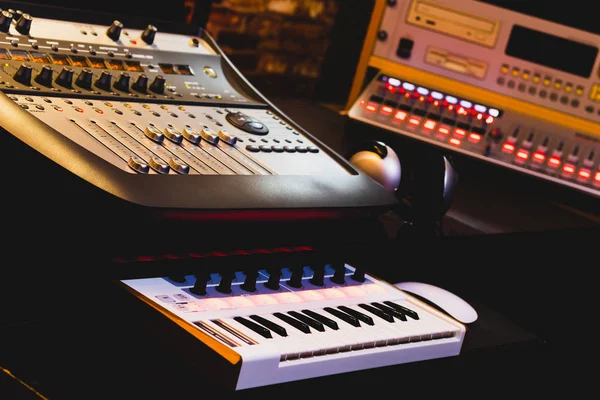 professional music production equipment in home studio