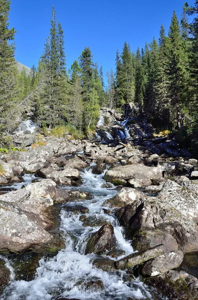 Altai mountains, waterfall on the river Poperechnaya