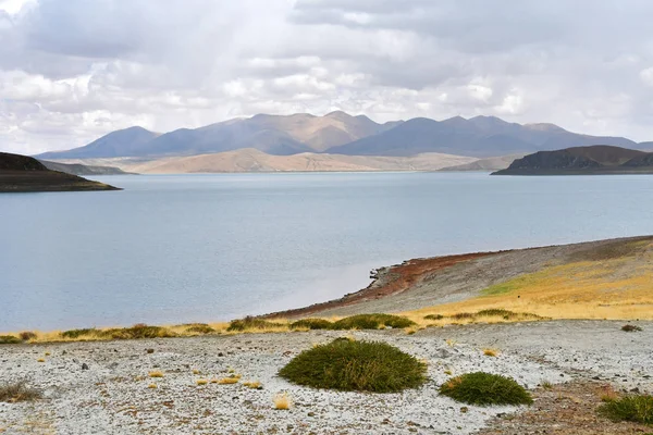 Great lakes of Tibet. The Holy lake of the Rakshas Tal (Lakngar-TSO) in cloudy weather