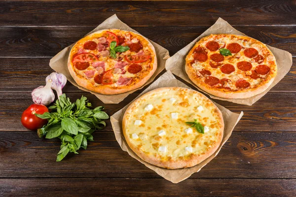 Small mini pizza (mini, miniature). Set of different mini pizzas