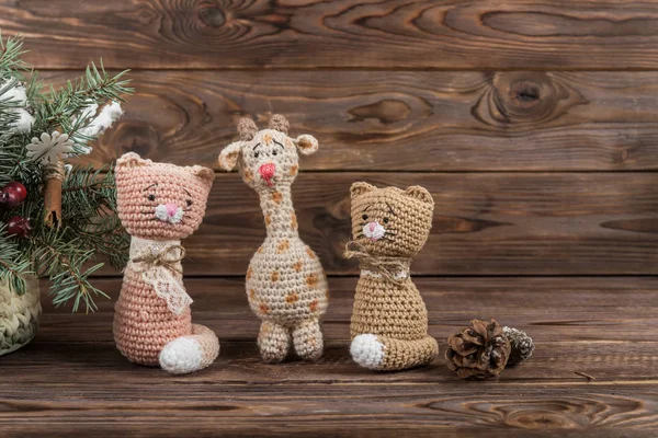 Crochet kraft toys cat, giraffe and deer. Christmas toys