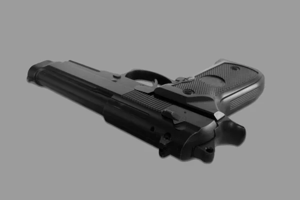 Пистолет Сером Фоне Изолированный — стоковое фото