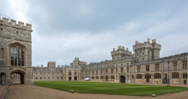 WINDSOR, ENGLAND -MAY, 24 2018: Windsor Castle, built in the 11th Century, is   the residence of the British Royal Family at Windsor in the English county of Berkshire, United Kingdom   clipart