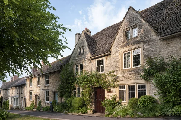 Quaint Cotswold romantic stone cottages on The Hill,  in the lovely Burford village, Cotswolds, Oxfordshire, England
