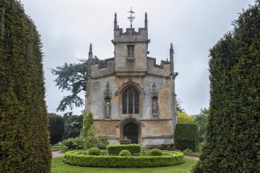 ST. MARY'S CHAPEL, SUDELEY CASTLE, WINCHCOMBE, GLOUCESTERSHIRE, ENGLAND - MAY, 26 2018: The Chapel is the buriel place of Catherne Parr the 6th wife of King Henry VIII   clipart