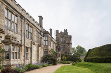 SUDELEY CASTLE, WINCHCOMBE, GLOUCESTERSHIRE, ENGLAND - MAY, 26 2018: 16th century Sudeley Castle and its gardens in Winchcombe, Gloucestershire, Cotswolds, England clipart