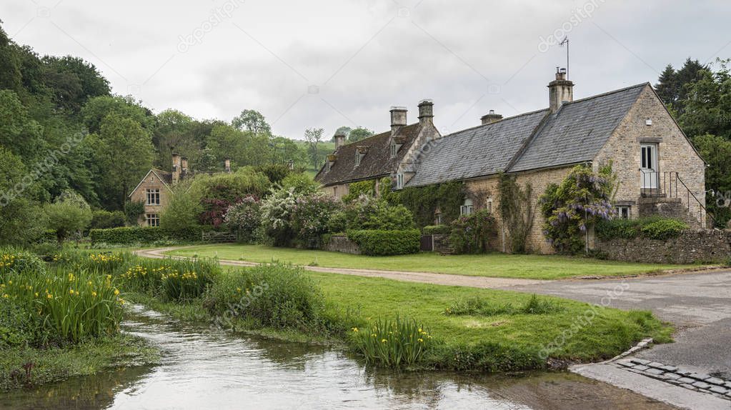 UPPER SLAUGHTER, COTSWOLDS, GLOUCESTERSHIRE, ENGLAND - MAY, 27 2018: Charming corners of the beautiful and pretty village of Upper Slaughter in the Cotswolds region - Gloucestershire, Cotswolds, UK