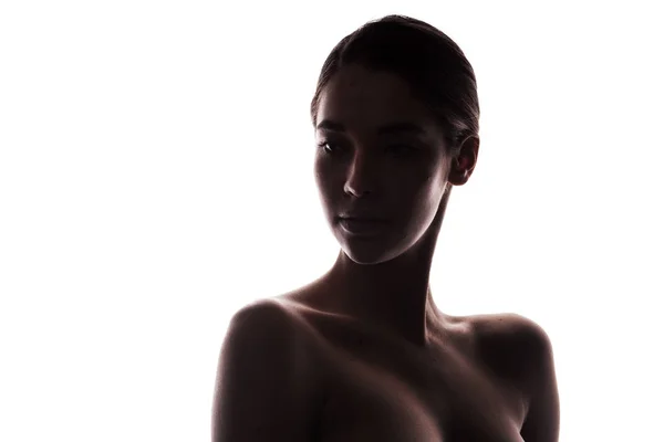 Silhouette einer jungen erwachsenen Frau mit sauberer, frischer Haut — Stockfoto