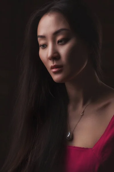 Closeup studio portrait of beautiful Asian woman — Stock Photo, Image