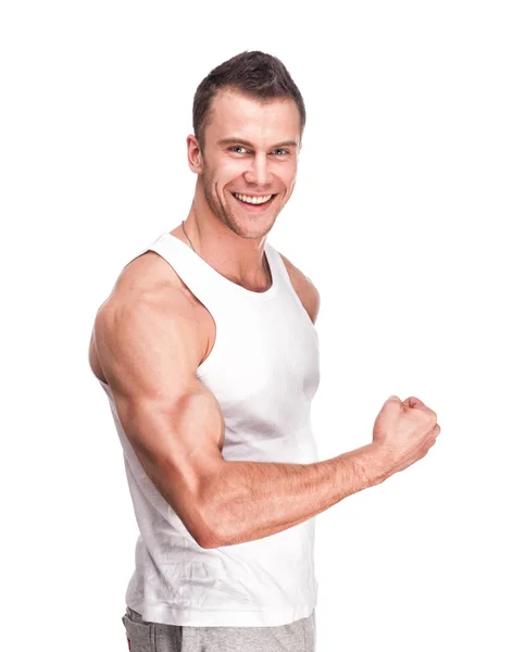 Muscular handsome man posing in studio — Stock Photo, Image