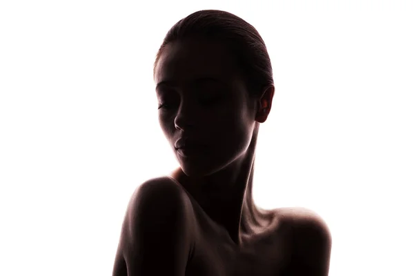 Silhouette of young adult woman with clean fresh skin — Stock Photo, Image