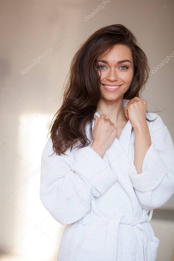 woman in a bathrobe, spa and care portrait