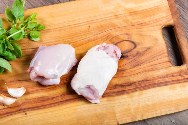 Raw Chicken Thighs Chopping Board Herbs — Stock Photo, Image