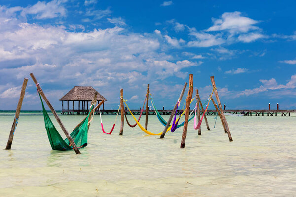 Hammocks in the water at Punta Cocos, Isla Holbox, Mexico