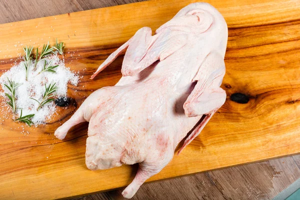 Whole Raw Duck Chopping Board Herbs — Stock Photo, Image