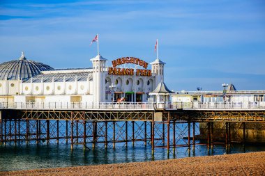 Scenic view of Brighton Palace Pier, one of the most popular tourist attraction in the seaside town of Brighton in England, United Kingdom clipart