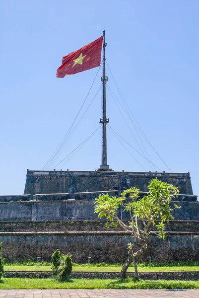The Flag Tower (with Vietnamese flag (Nguyen Dynasty) part of the citadel in Hue, the ancient capital of Vietnam, Asia