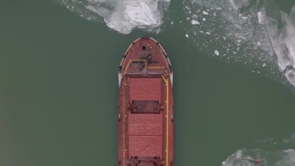 Aerial view of the ship slowly moving through ice floes — Stock Video