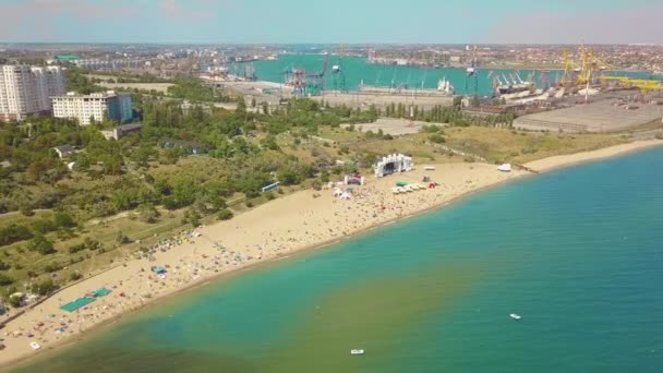 Aerial view of a Commercial port with container ships during loading and unloading. 4K — Stock Video